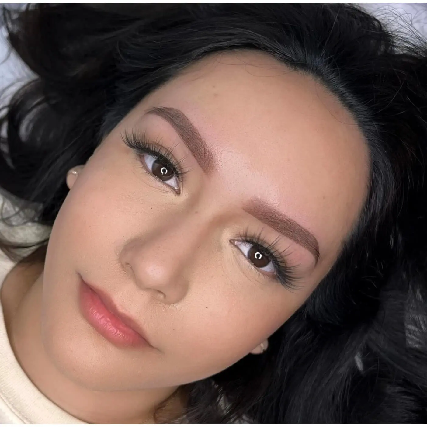 Soft ombre powder brows with natural shading and defined shape at Mika Beauty and Brows in San Diego